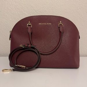 Michael Kors Round Emmy purse with cross body strap